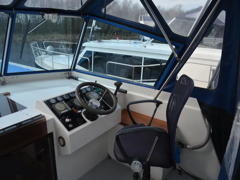 Cockpit of Holidaytime, a De Drait Safari Houseboat 1200 motorboat at Drachten, Netherlands