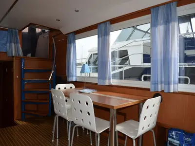 Salon of Holidaytime, a De Drait Safari Houseboat 1200 motorboat at Drachten, Netherlands