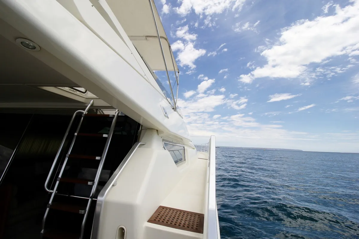 Deck of Tres Sirenas, a Ferretti 175 FLY motorboat at es Jonquet, Spain