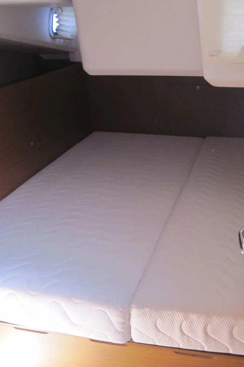 Cabin on Enrica, a Jeanneau Sun Odyssey 440 sailboat at Capo d'Orlando, Italy