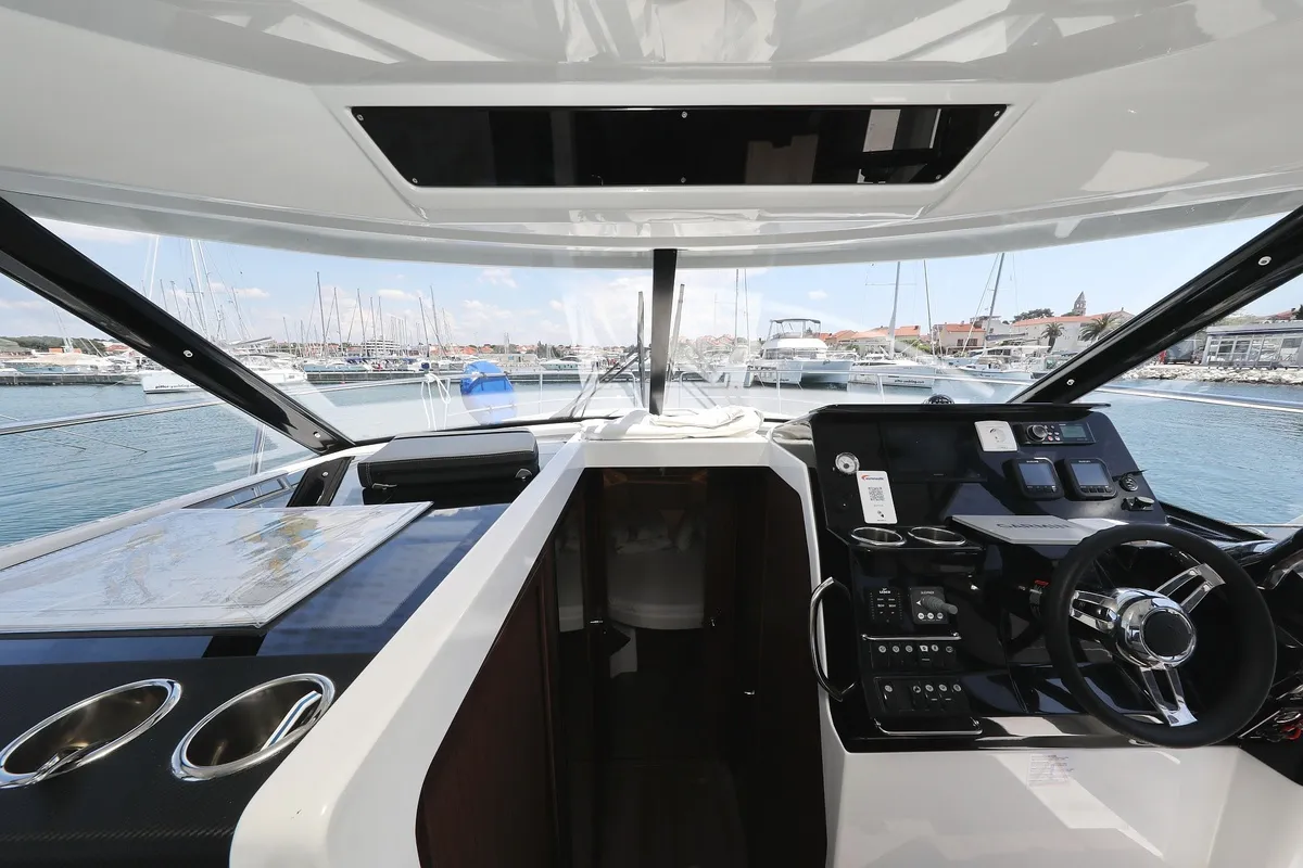 Cockpit of Raptor, a Jeanneau Merry Fisher 1095 Fly motorboat at Grad Biograd na Moru, Croatia