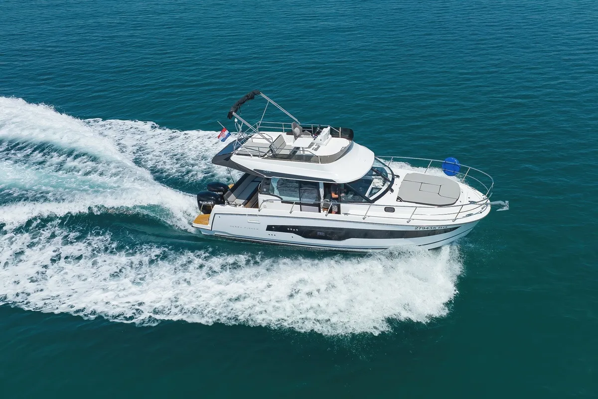 Exterior view of Raptor, a Jeanneau Merry Fisher 1095 Fly motorboat at Grad Biograd na Moru, Croatia