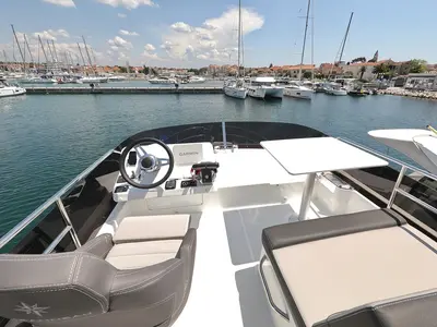 Cockpit of Raptor, a Jeanneau Merry Fisher 1095 Fly motorboat at Grad Biograd na Moru, Croatia