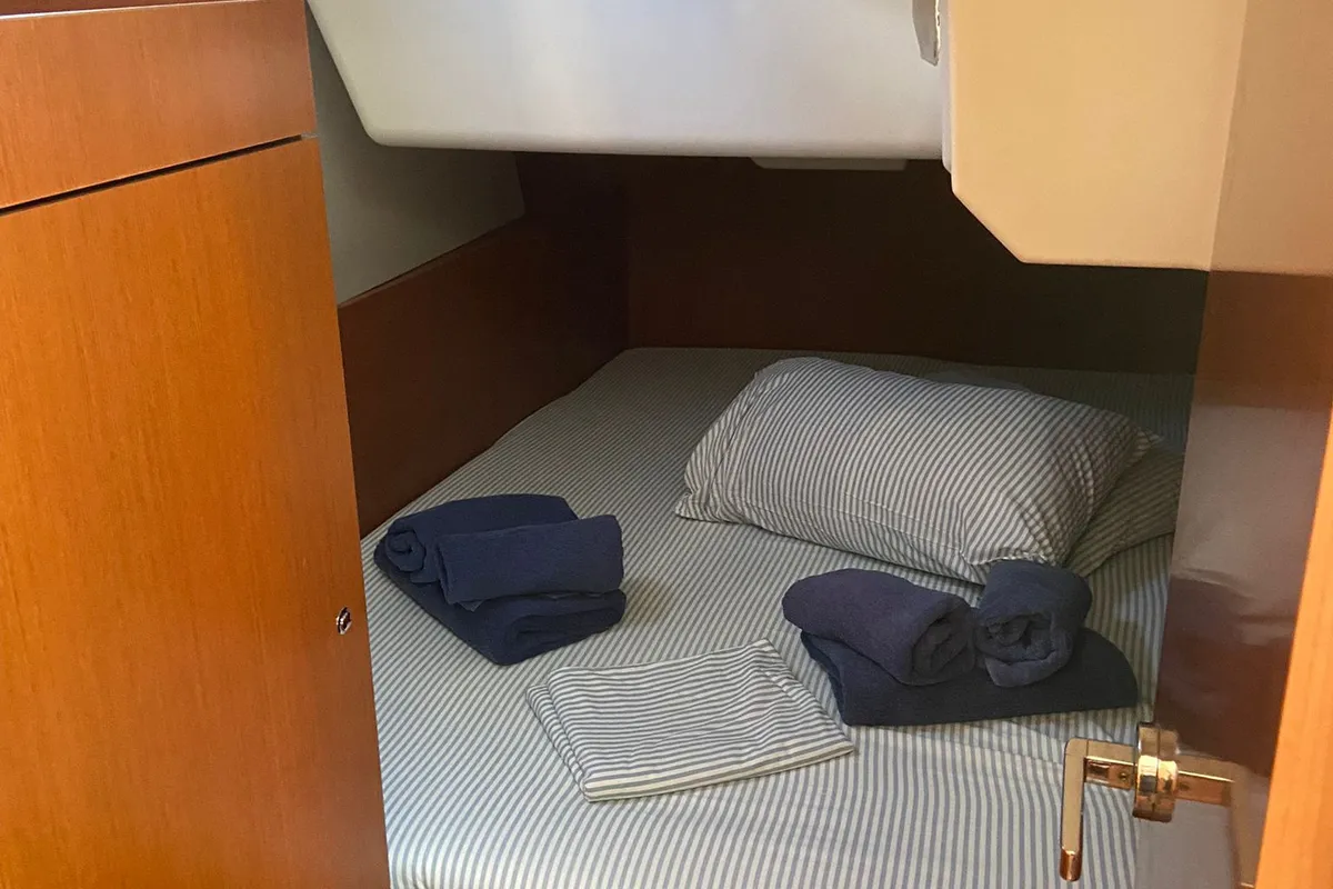 Cabin on Caroline, a Beneteau Oceanis 38 sailboat at Procida, Italy