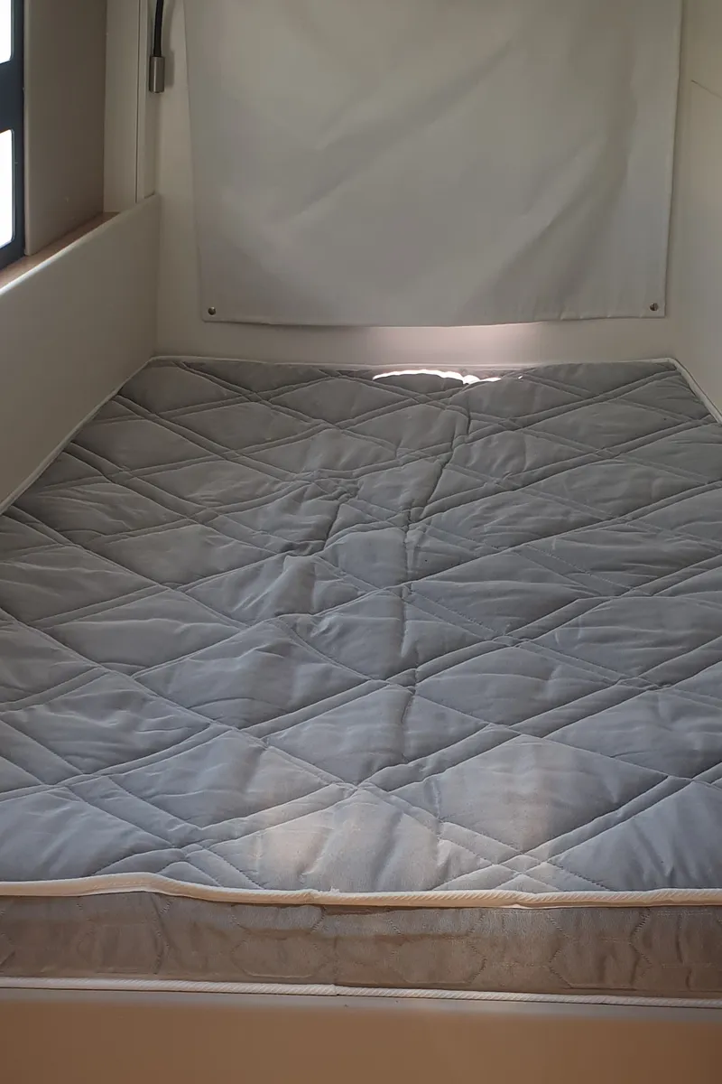 Cabin on Lullaby, a Nautitech 40 Open catamaran at Tropea, Italy