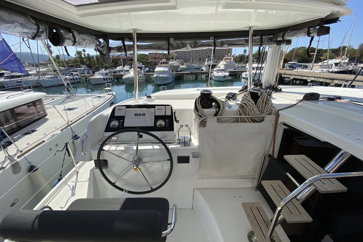 Cockpit of Blue Eyes, a Lagoon 42 catamaran at Olbia, Italy