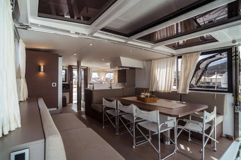 Salon of Arianna, a Bali 4.8 catamaran at Olbia, Italy