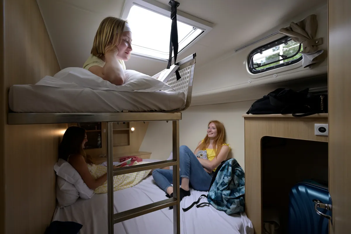 Cabin on Orchestra, a Nicols Octo Fly 12 motorboat at Grez-Neuville, France
