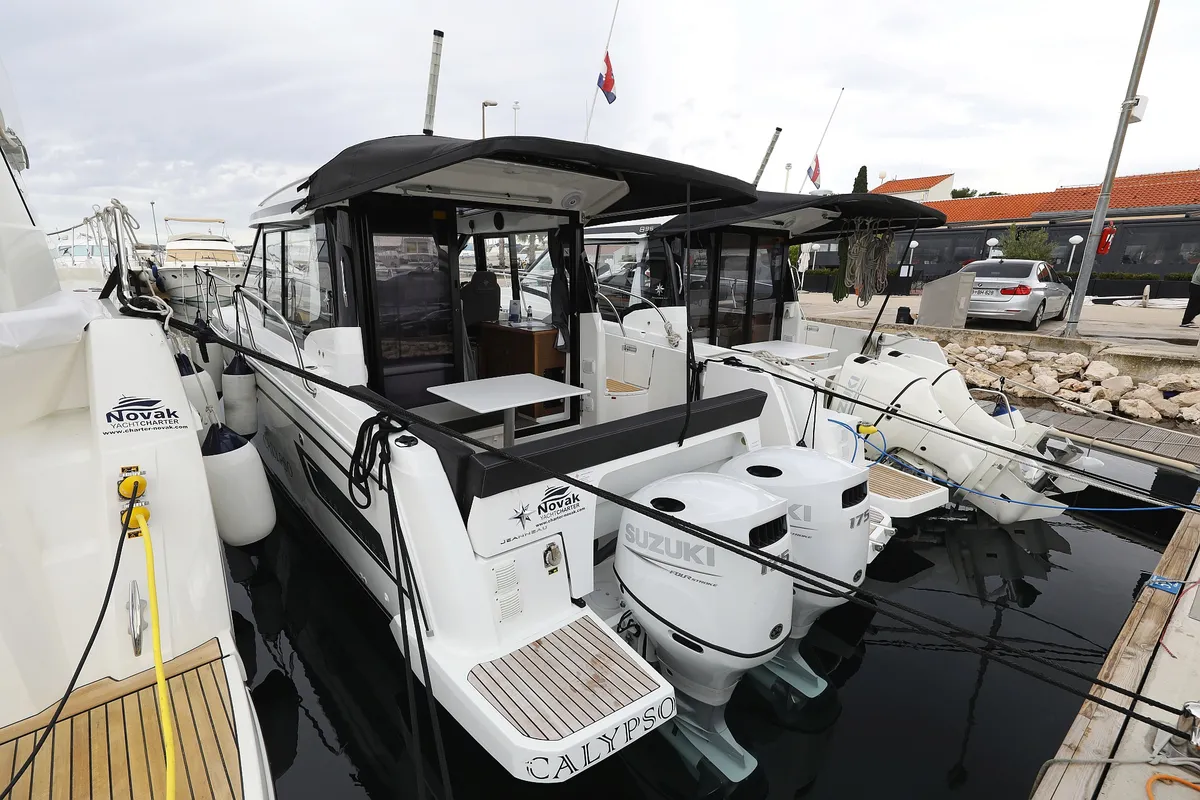 Exterior view of Calypso, a Jeanneau Merry Fisher 895 motorboat at Grad Biograd na Moru, Croatia