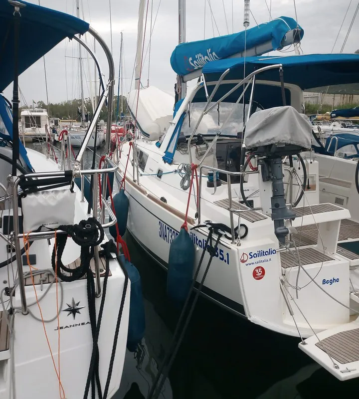 Exterior view of Beghe, a Beneteau Oceanis 35.1 sailboat at Cannigione, Italy
