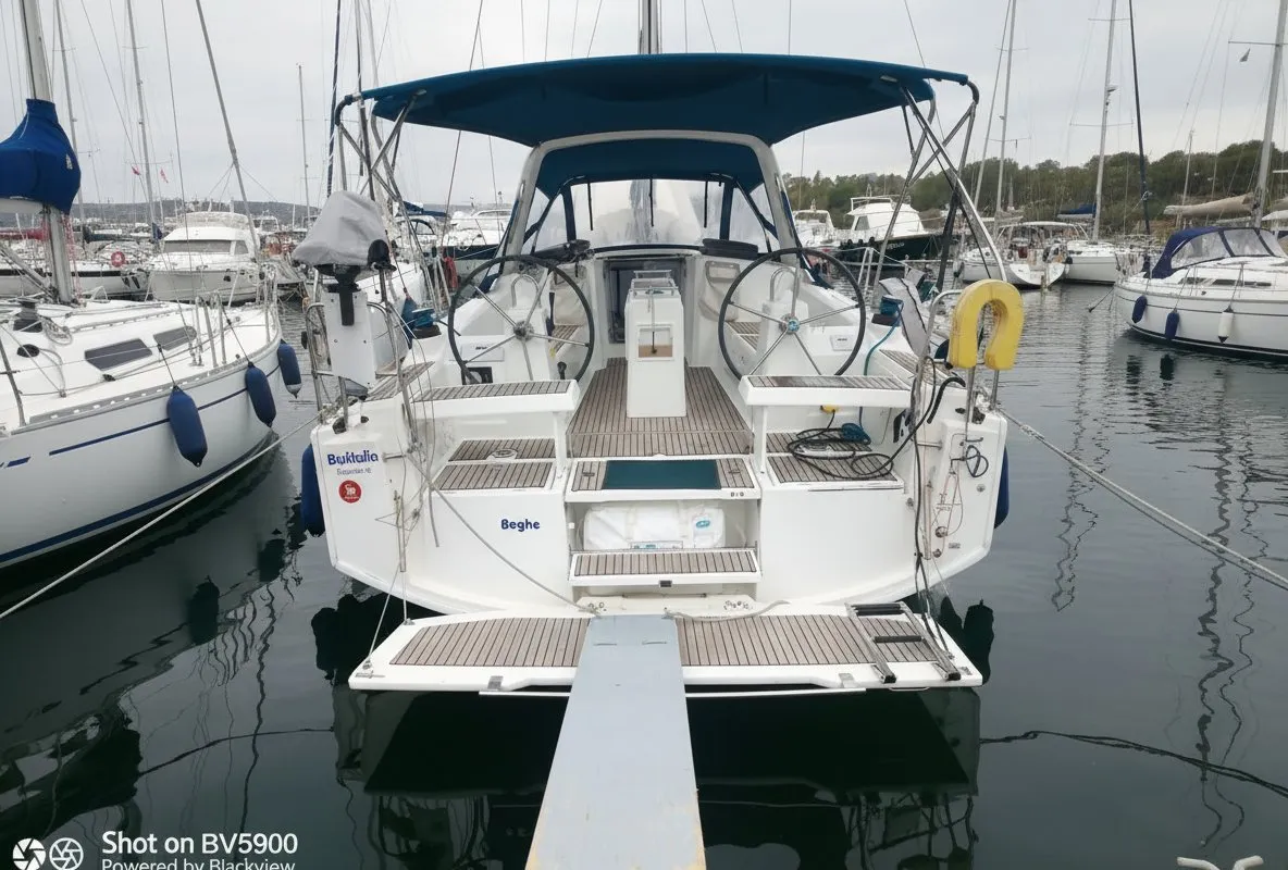 Exterior view of Beghe, a Beneteau Oceanis 35.1 sailboat at Cannigione, Italy
