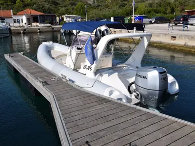 Exterior view of Sunshine, a Brig Eagle 645 motorboat at Primošten, Croatia