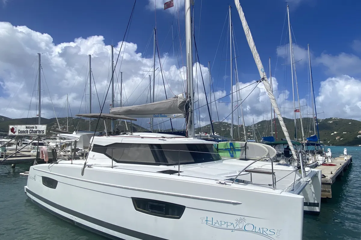 Exterior view of Happy Ours, a Fountaine Pajot Lucia 40 catamaran at Road Town, British Virgin Islands