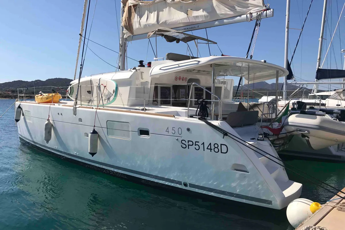 Exterior view of Dugongo, a Lagoon 450 Fly catamaran at Olbia, Italy
