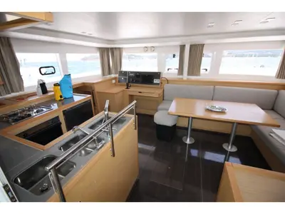 Salon of Dugongo, a Lagoon 450 Fly catamaran at Olbia, Italy