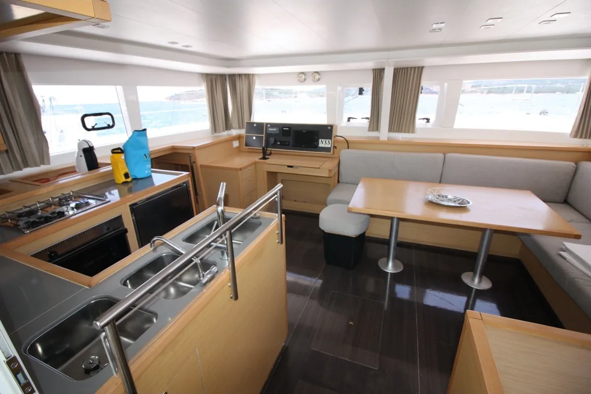 Salon of Dugongo, a Lagoon 450 Fly catamaran at Olbia, Italy