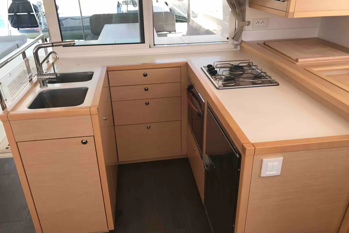 Galley of Dugongo, a Lagoon 450 Fly catamaran at Olbia, Italy
