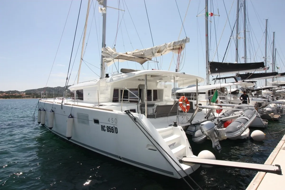 Exterior view of Dugongo, a Lagoon 450 Fly catamaran at Olbia, Italy