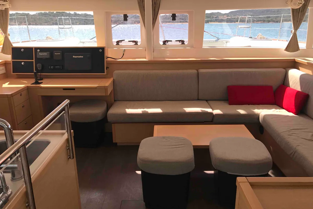 Salon of Dugongo, a Lagoon 450 Fly catamaran at Olbia, Italy