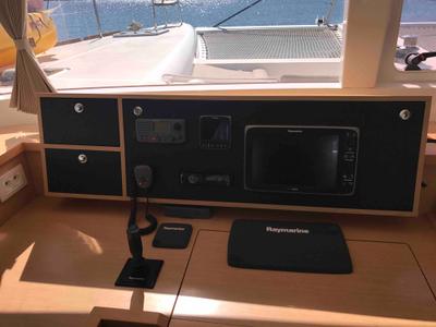 Cockpit of Dugongo, a Lagoon 450 Fly catamaran at Olbia, Italy