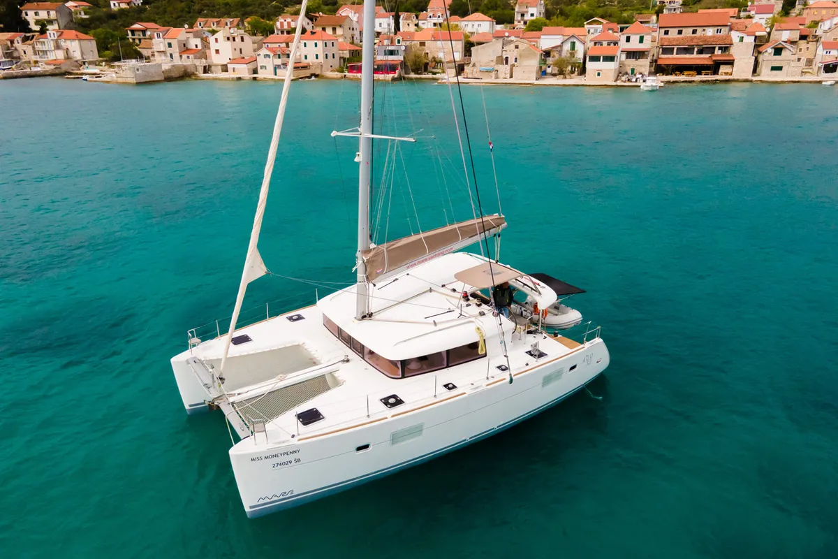 Exterior view of Miss Moneypenny, a Lagoon 400 S2 catamaran at Grad Šibenik, Croatia