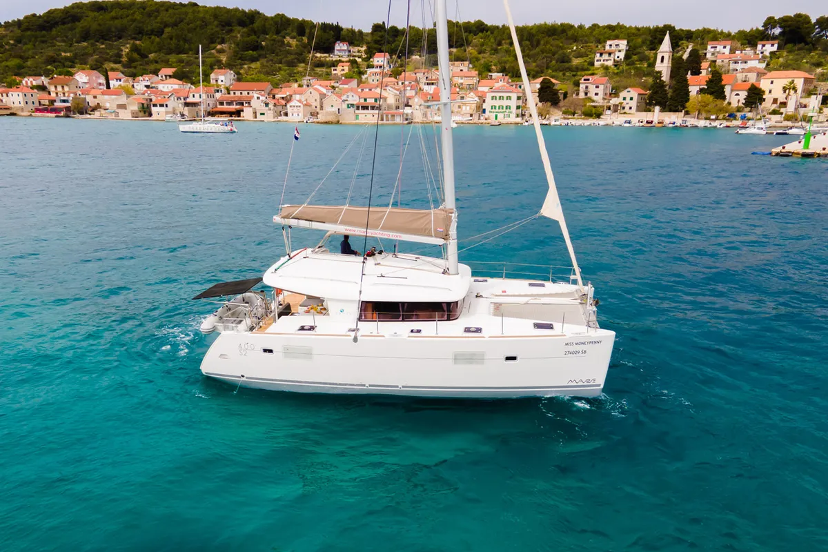 Exterior view of Miss Moneypenny, a Lagoon 400 S2 catamaran at Grad Šibenik, Croatia