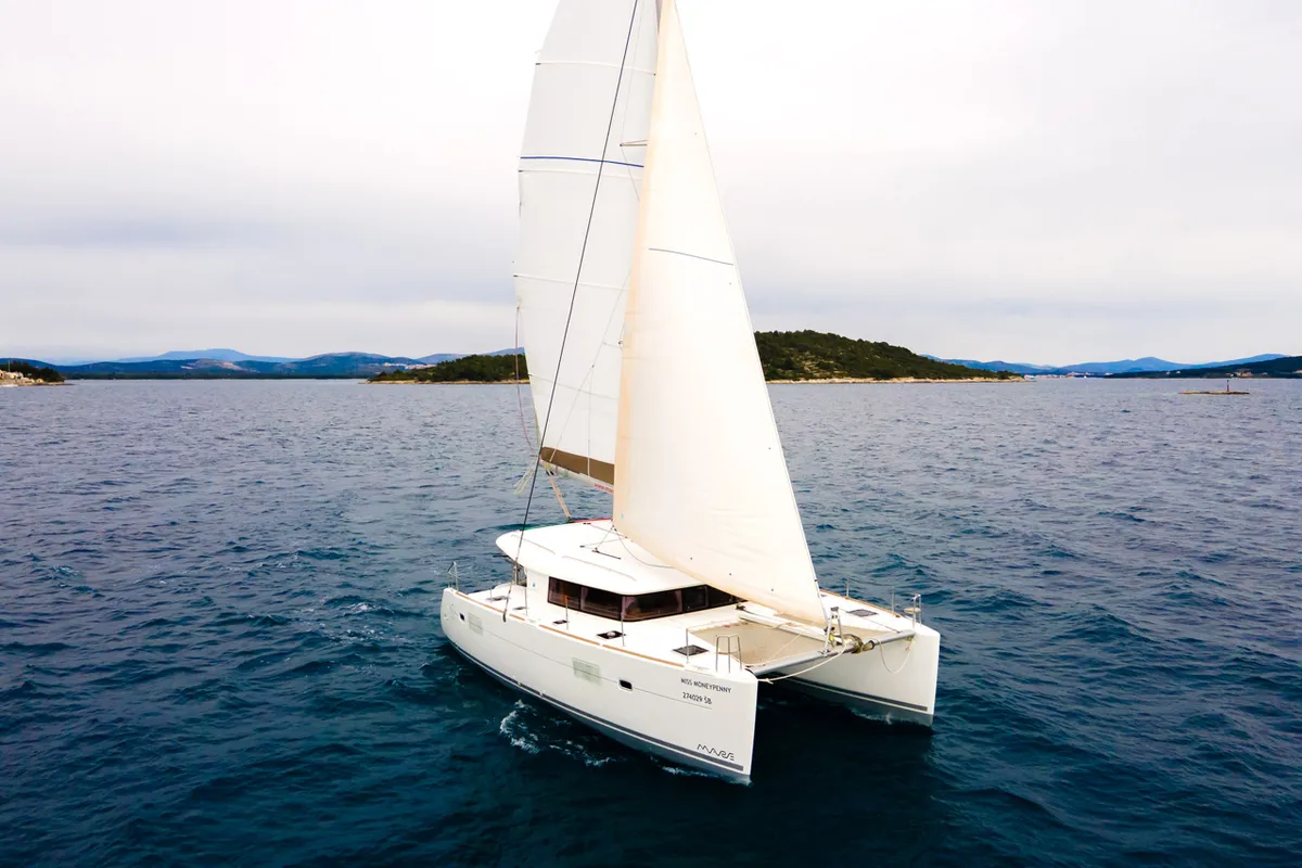 Exterior view of Miss Moneypenny, a Lagoon 400 S2 catamaran at Grad Šibenik, Croatia