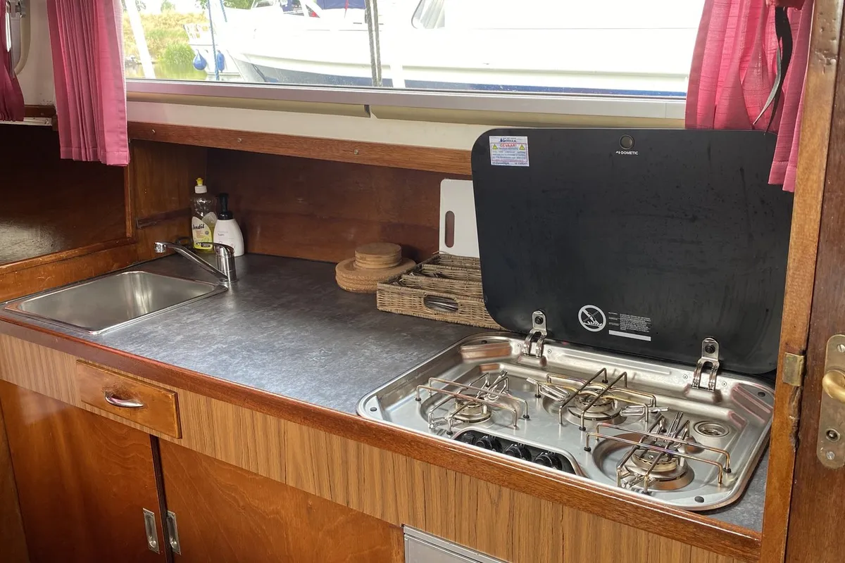 Galley of Haedi, a Courtevenne 830 motorboat at Heukelum, Netherlands