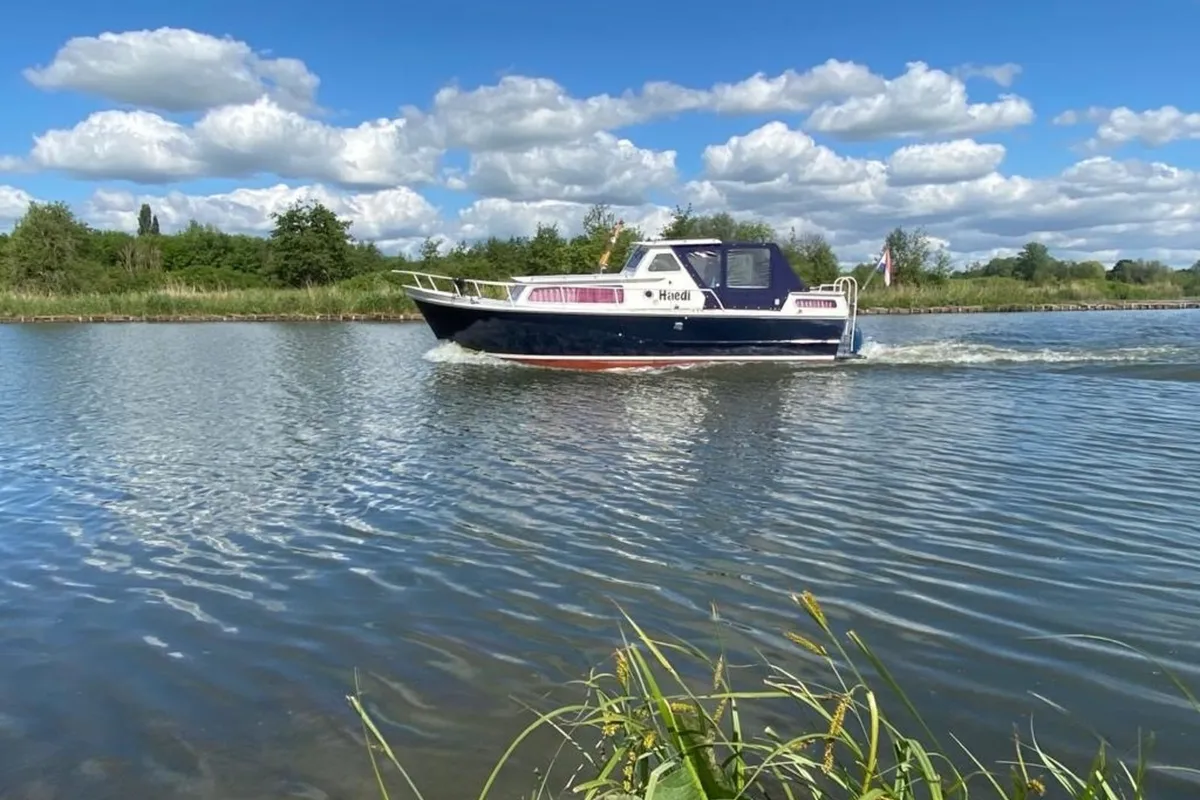 Exterior view of Haedi, a Courtevenne 830 motorboat at Heukelum, Netherlands