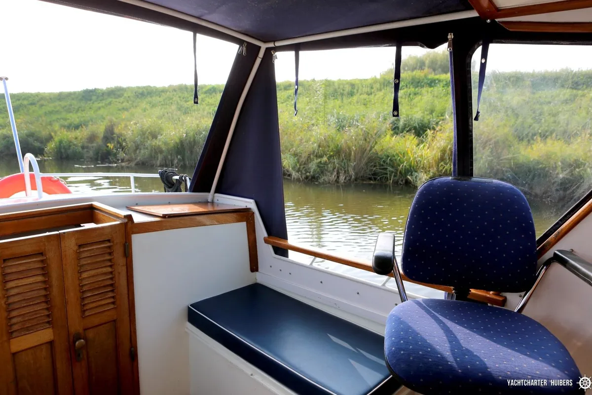 Cockpit of Haedi, a Courtevenne 830 motorboat at Heukelum, Netherlands