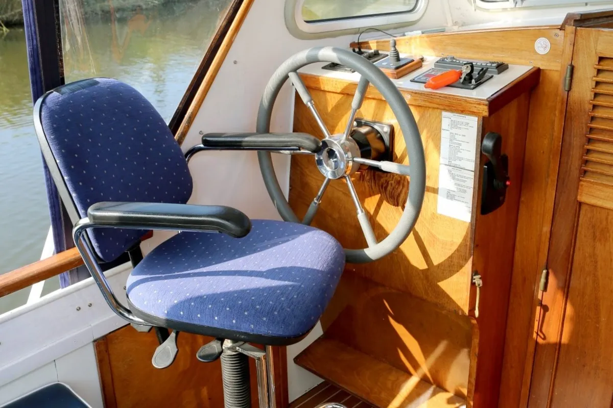 Cockpit of Haedi, a Courtevenne 830 motorboat at Heukelum, Netherlands