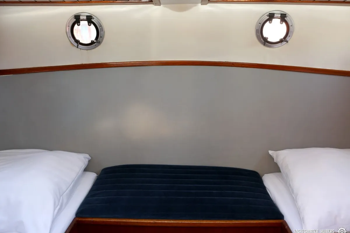 Cabin on Haedi, a Courtevenne 830 motorboat at Heukelum, Netherlands