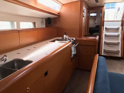 Galley of Alboran Prosecco (Majorca), a Jeanneau Sun Odyssey 519 sailboat at es Jonquet, Spain