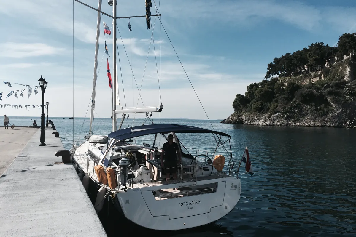 Exterior view of Roxanna, a Beneteau Oceanis 48 sailboat at Ibiza, Spain