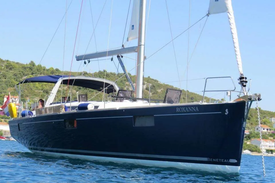 Exterior view of Roxanna, a Beneteau Oceanis 48 sailboat at Ibiza, Spain