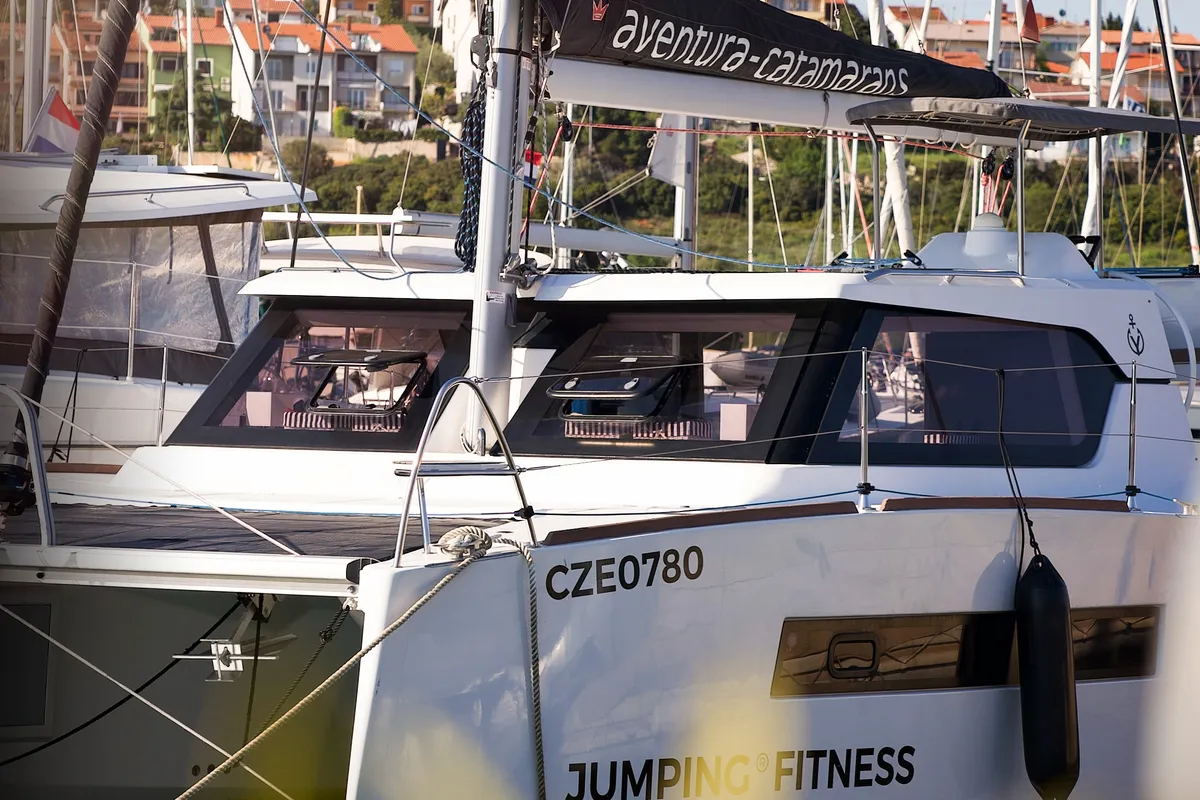 Exterior view of Jumping Fitness, a Aventura 34 catamaran at Šibenik, Croatia