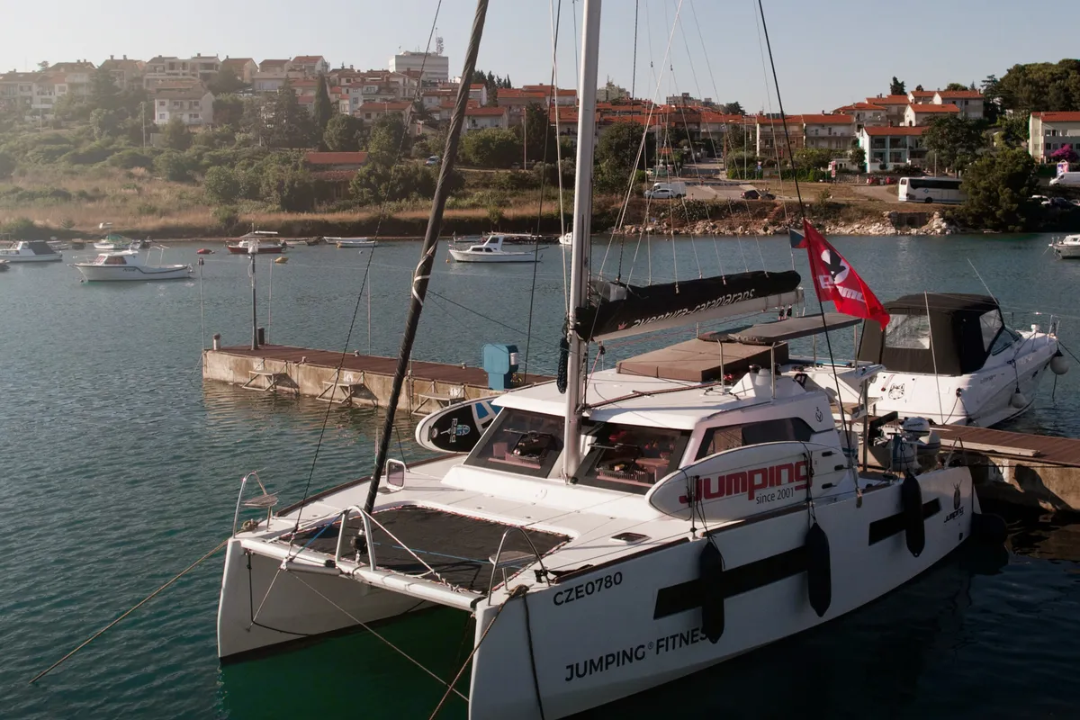 Exterior view of Jumping Fitness, a Aventura 34 catamaran at Šibenik, Croatia