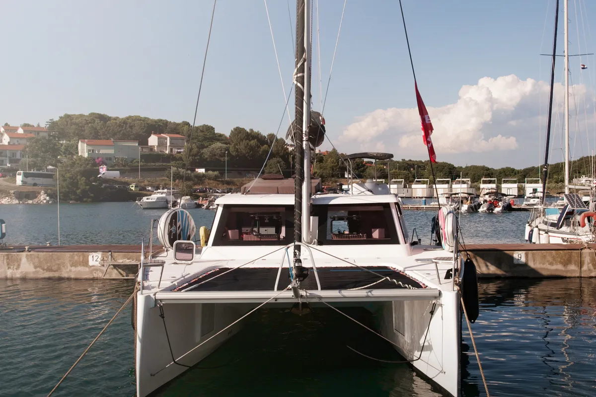 Exterior view of Jumping Fitness, a Aventura 34 catamaran at Šibenik, Croatia
