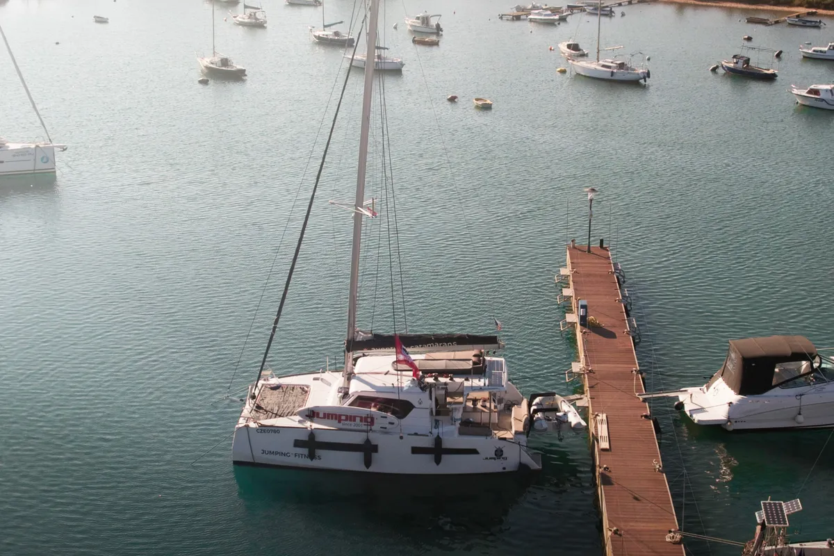 Exterior view of Jumping Fitness, a Aventura 34 catamaran at Šibenik, Croatia