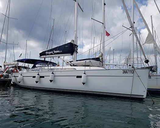 Exterior view of Ti Tengo D'okkio, a Bavaria Cruiser 46 sailboat at Procida, Italy