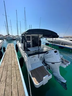 Exterior view of Klapa, a Jeanneau Merry Fisher 795 motorboat at Municipality of Novigrad, Croatia
