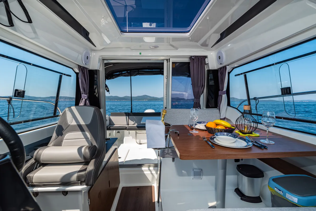 Salon of Klapa, a Jeanneau Merry Fisher 795 motorboat at Municipality of Novigrad, Croatia