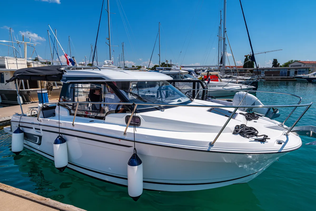 Exterior view of Klapa, a Jeanneau Merry Fisher 795 motorboat at Municipality of Novigrad, Croatia