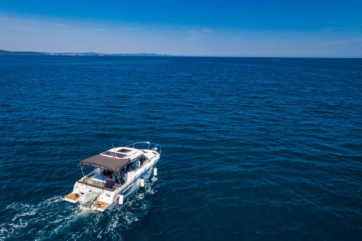 Exterior view of Klapa, a Jeanneau Merry Fisher 795 motorboat at Municipality of Novigrad, Croatia