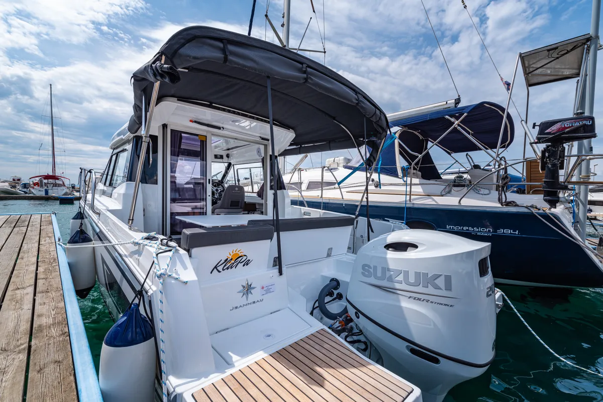 Exterior view of Klapa, a Jeanneau Merry Fisher 795 motorboat at Municipality of Novigrad, Croatia