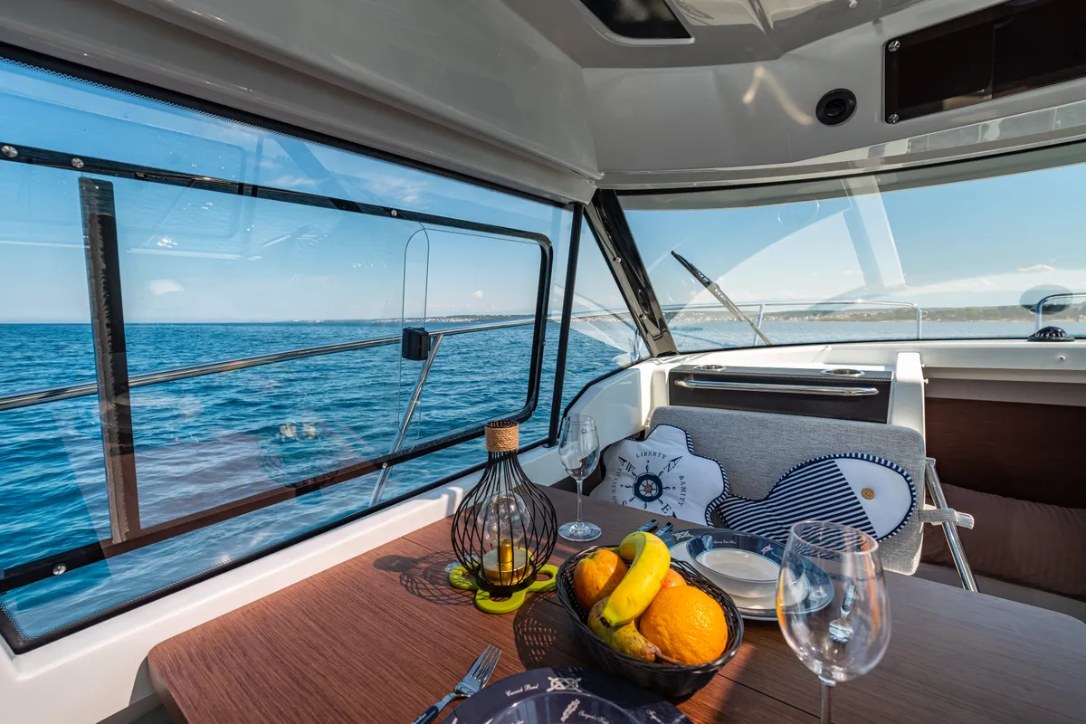 Salon of Klapa, a Jeanneau Merry Fisher 795 motorboat at Municipality of Novigrad, Croatia