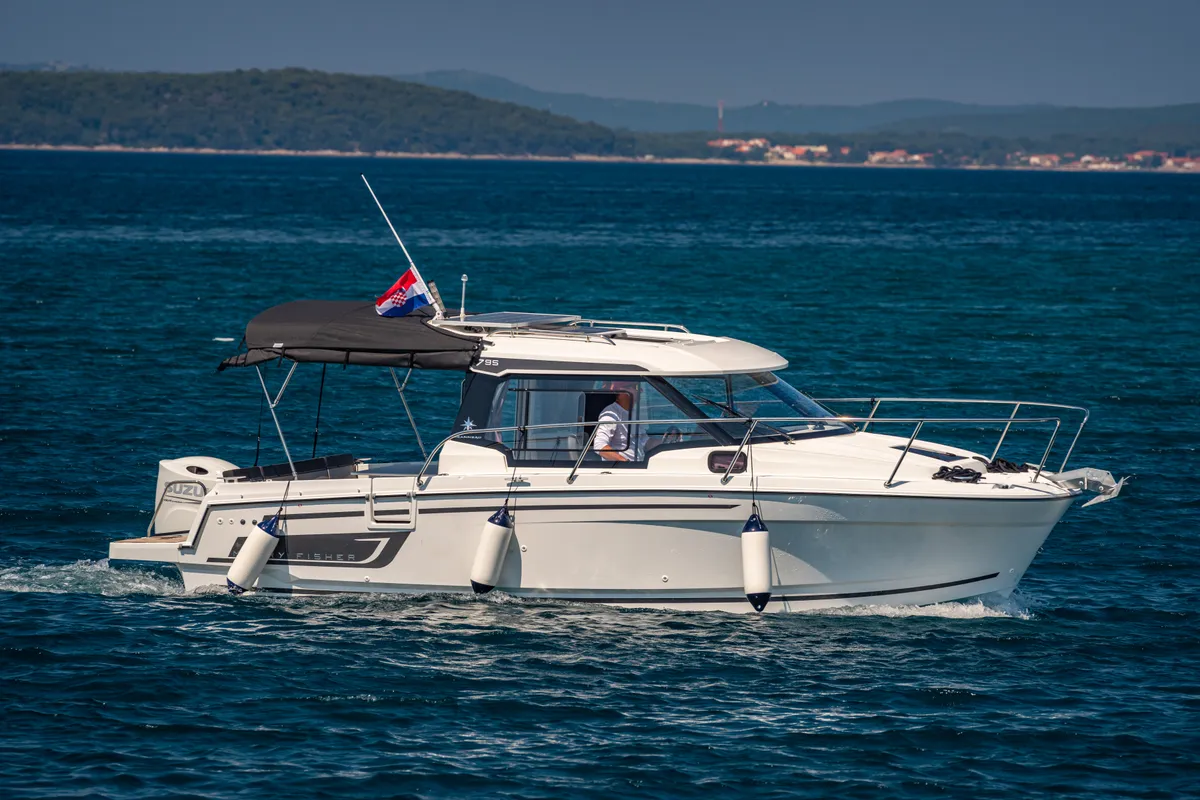 Exterior view of Klapa, a Jeanneau Merry Fisher 795 motorboat at Municipality of Novigrad, Croatia