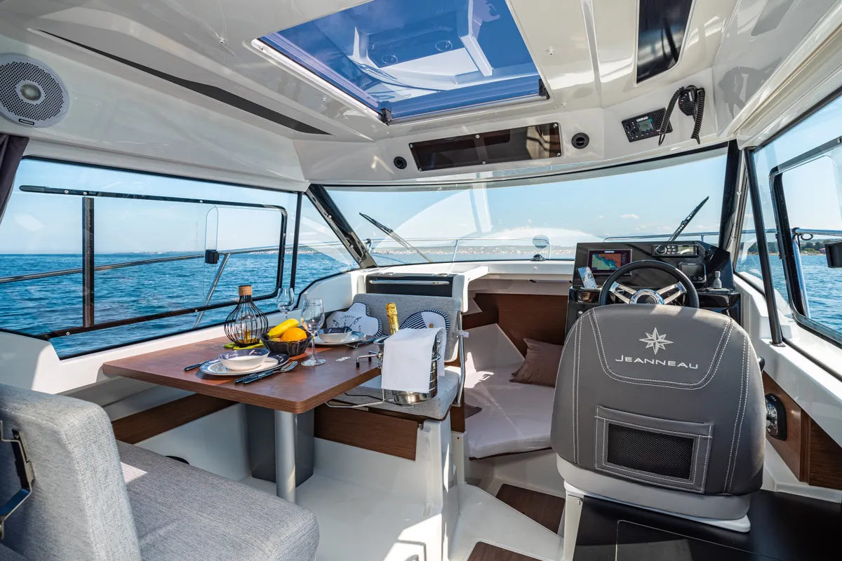 Salon of Klapa, a Jeanneau Merry Fisher 795 motorboat at Municipality of Novigrad, Croatia