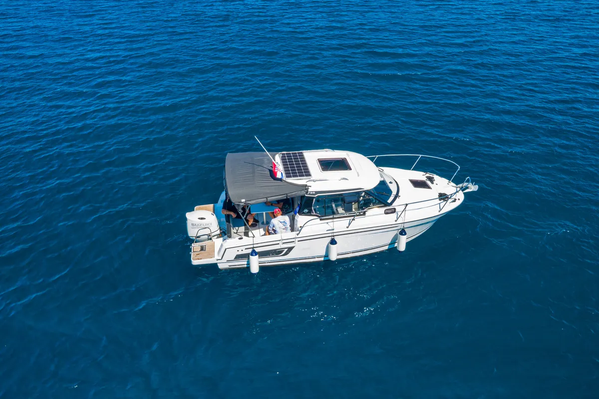 Exterior view of Klapa, a Jeanneau Merry Fisher 795 motorboat at Municipality of Novigrad, Croatia