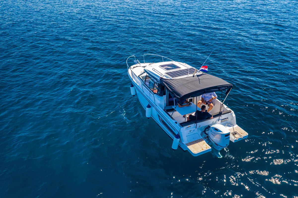 Exterior view of Klapa, a Jeanneau Merry Fisher 795 motorboat at Municipality of Novigrad, Croatia